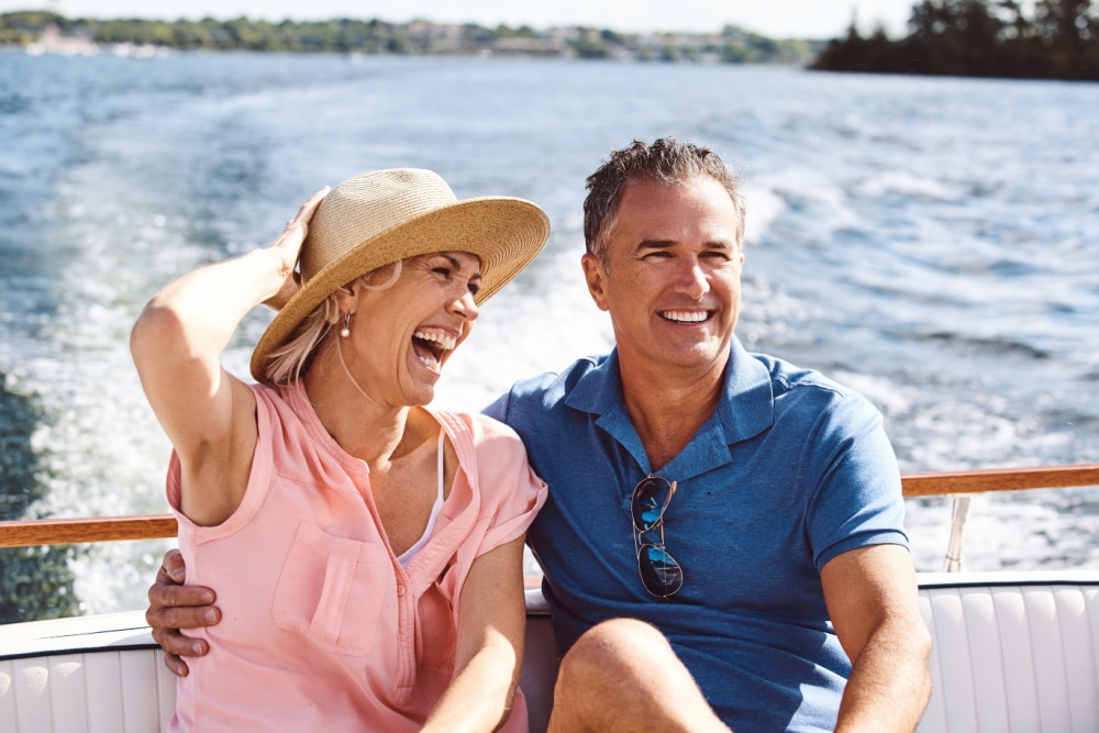 A couple on a yacht cruise.